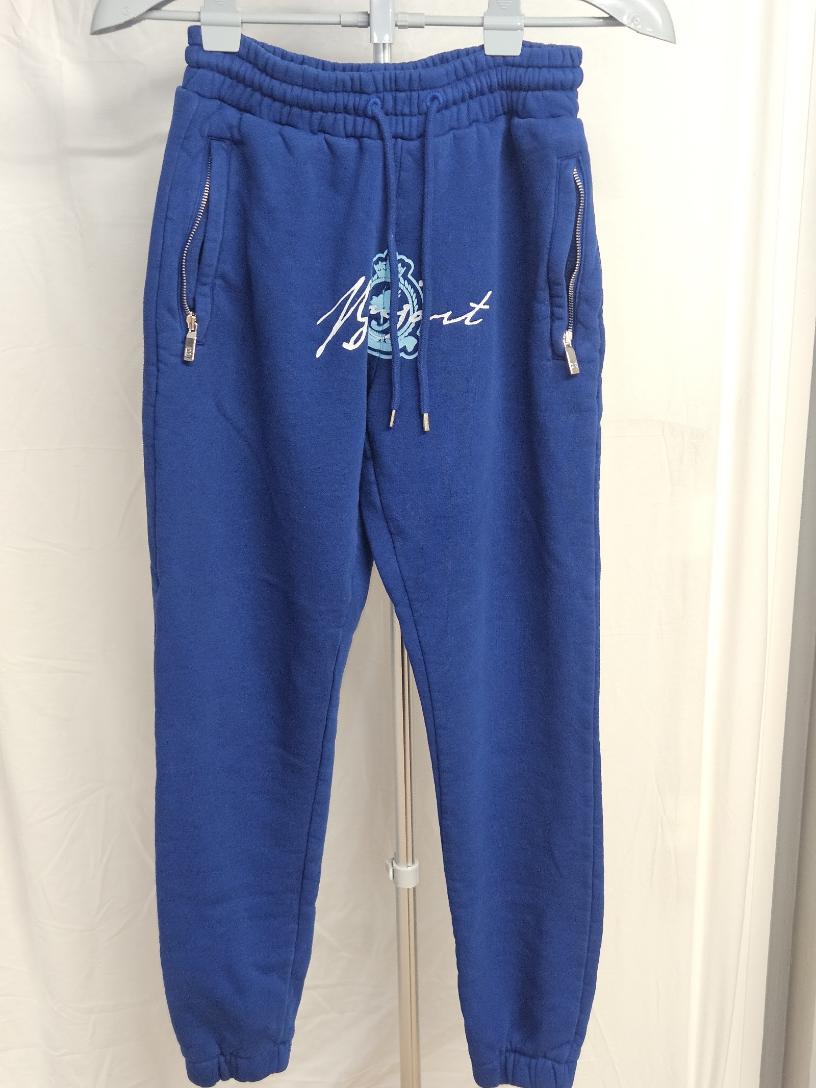 Benjart Royal-blue crest-logo cuffed joggers