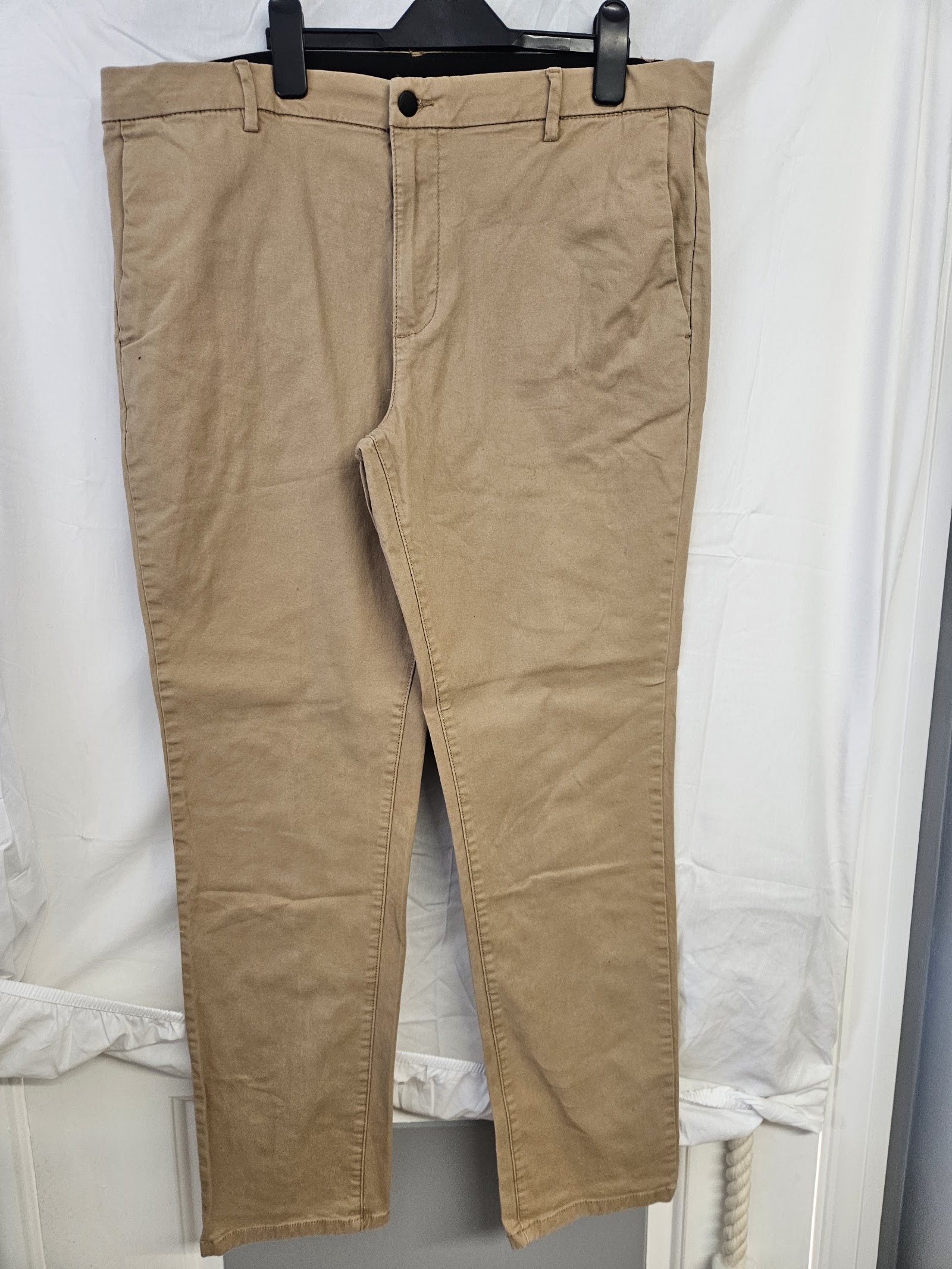 Levi’s 511 beige slim-fit trousers