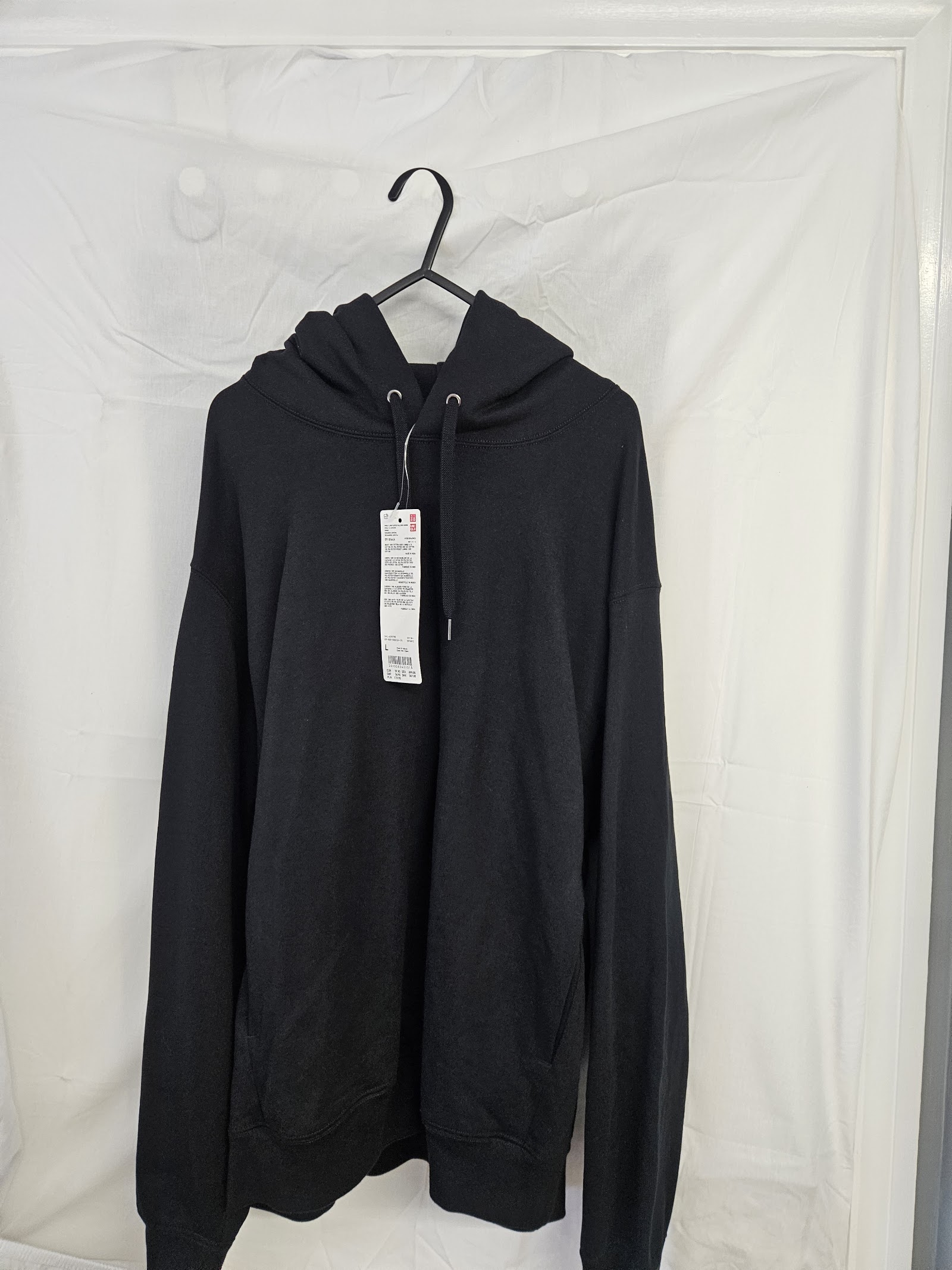 Uniqlo Black pullover hoodie with tags